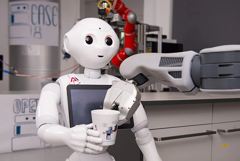Interdisziplinäre Forscherteams arbeiten daran Roboter zu befähigen Aufgaben in der realen Alltagswelt zu übernehmen.